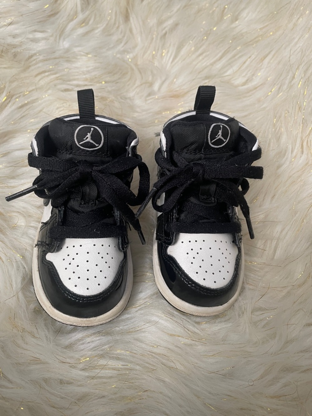 Jordan Kids Black and White High-Top Sneakers